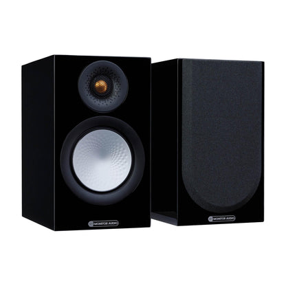 Pair of black speakers with visible brand logo on a white background