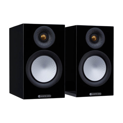 Pair of black speakers with visible brand logo on a white background