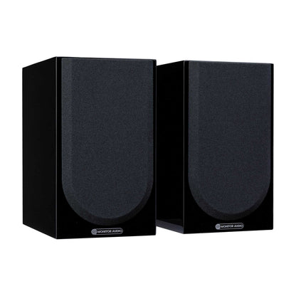 Pair of black speakers on a white background