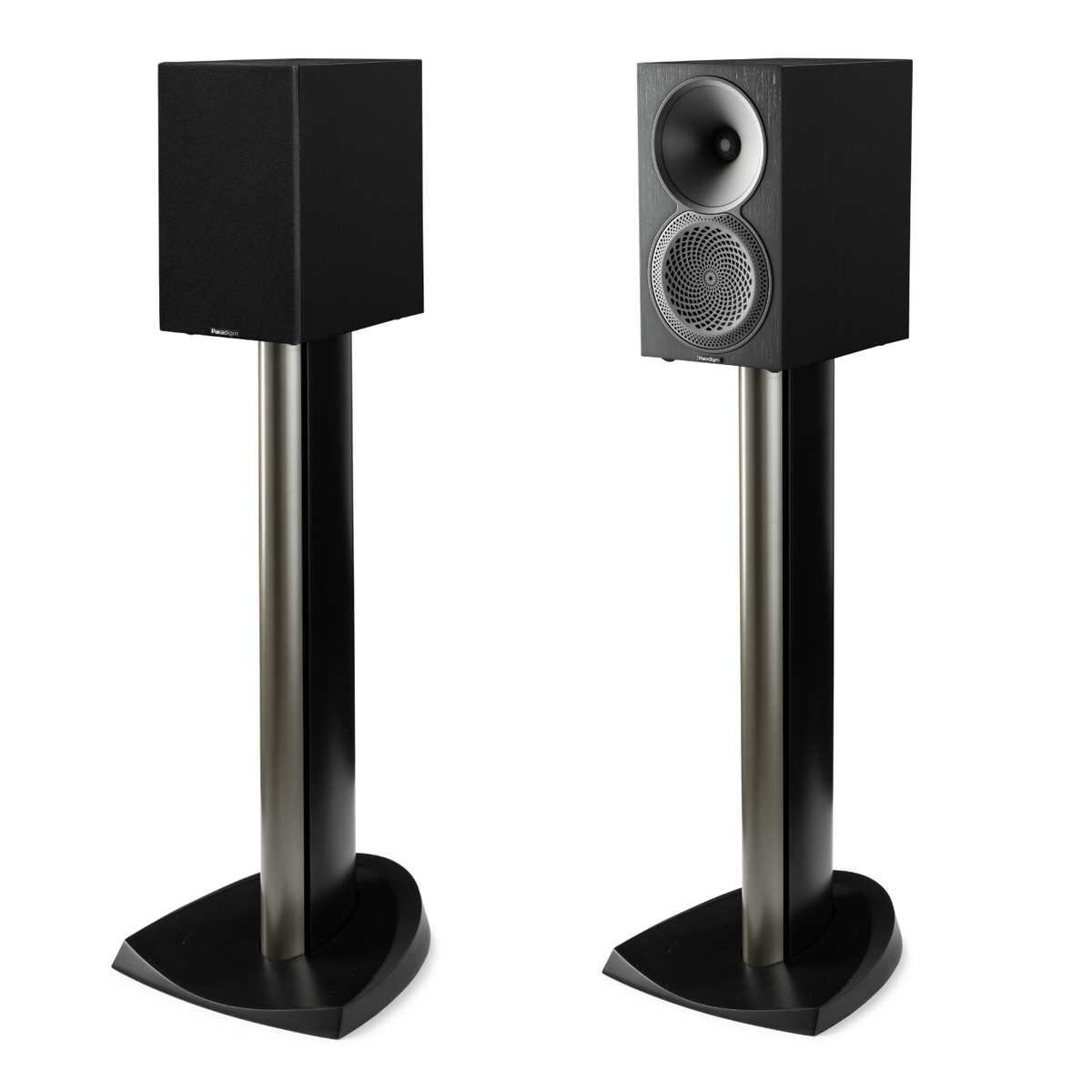 Pair of black bookshelf speakers on floor-stands on white background