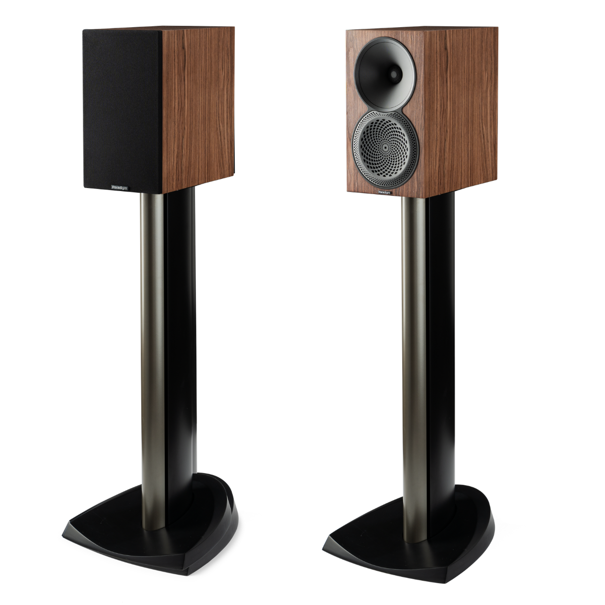Pair of wooden speakers on stands with a white background