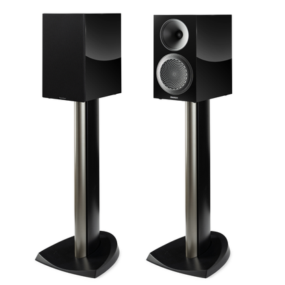 Pair of black speakers on stands against a white background
