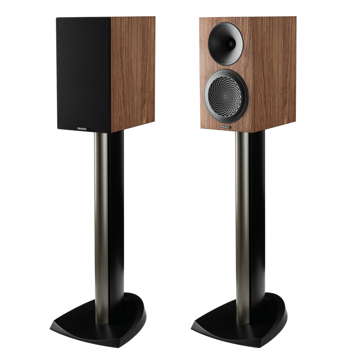 Pair of wooden speakers on stands with a white background
