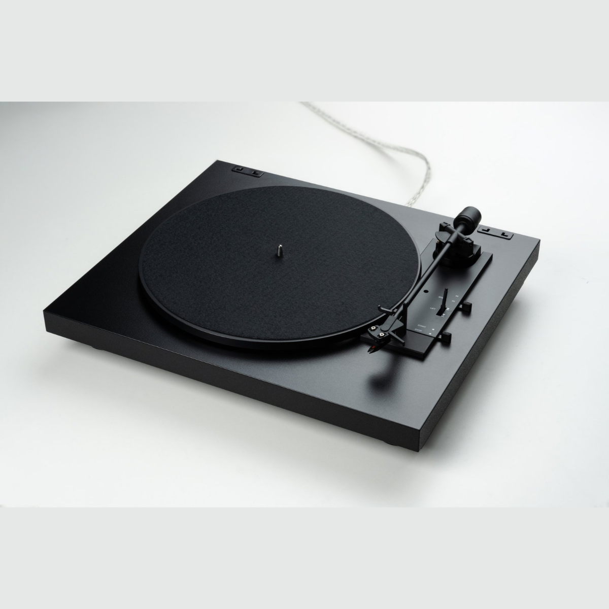 Pro-Ject A1.2 Automat Turntable on a gradient grey background