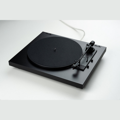 Pro-Ject A1.2 Automat Turntable on a gradient grey background