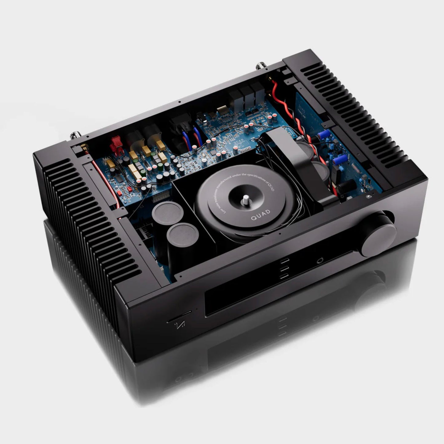Black audio amplifier with visible circuitry on a white background