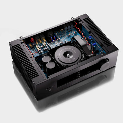 Black audio amplifier with visible circuitry on a white background