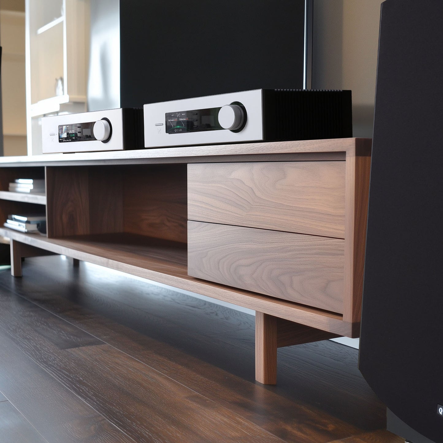 Wooden entertainment console with audio equipment on a wooden floor.