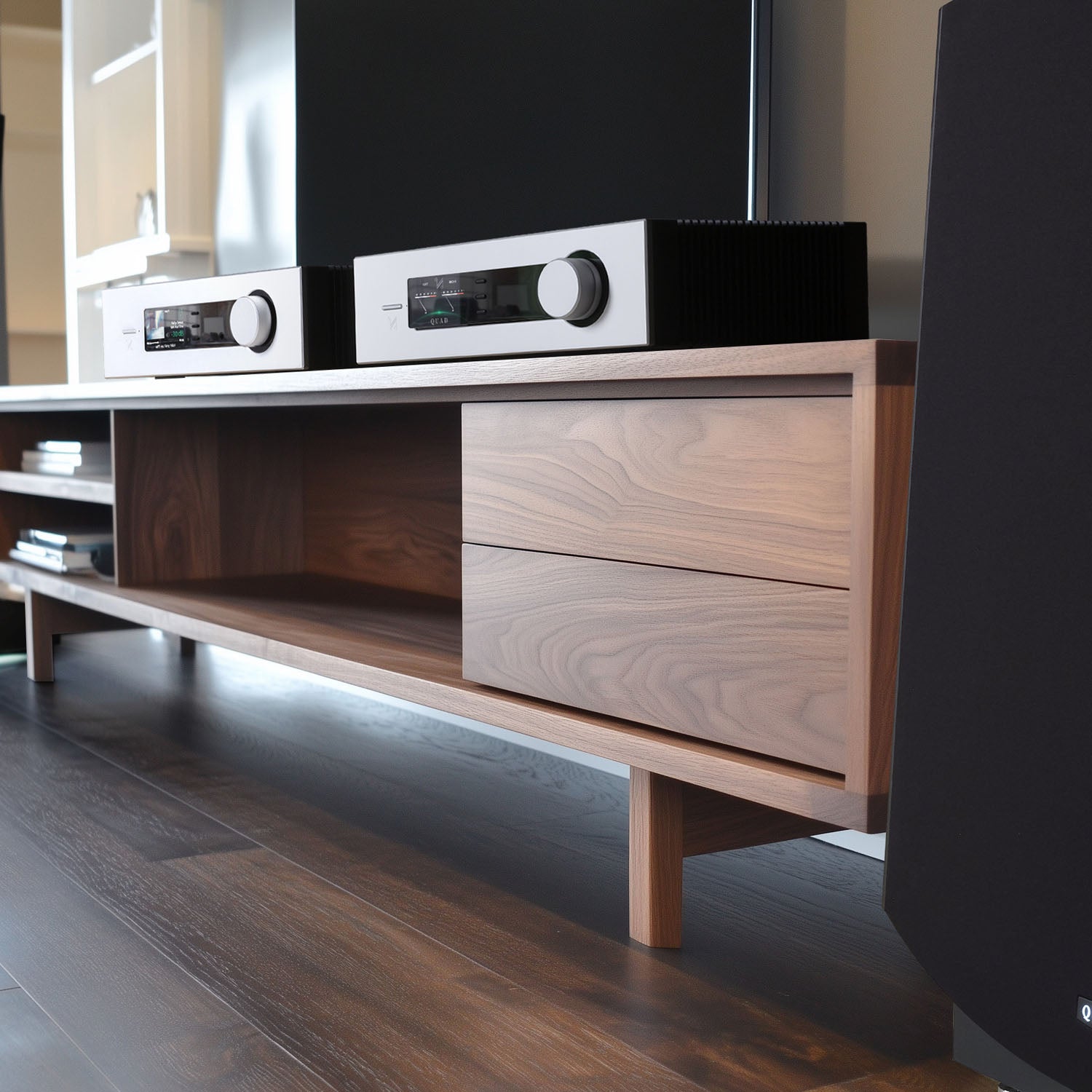 Wooden entertainment console with audio equipment on a wooden floor.