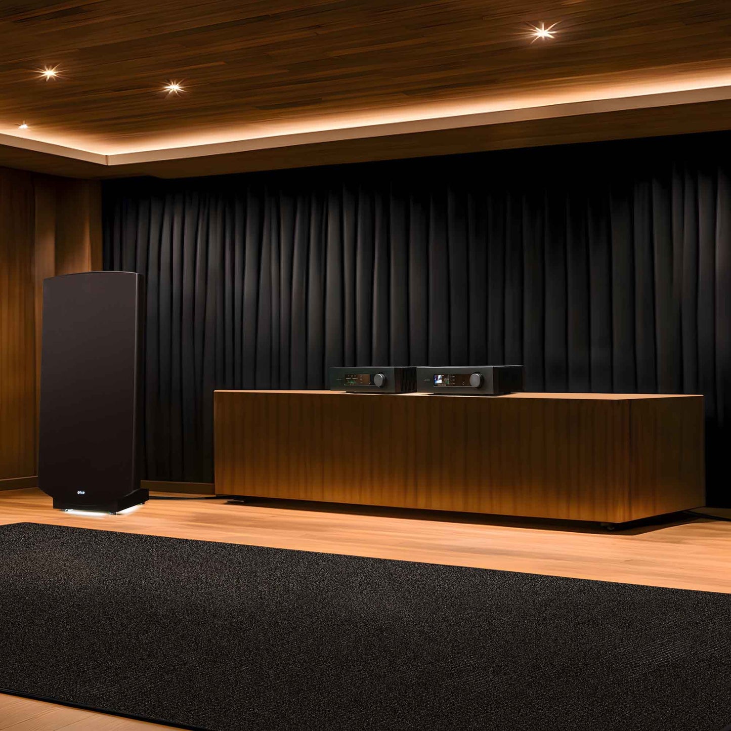 Quad Platina CDT CD Transport sitting on cabinet next to Magneplanar Speakers