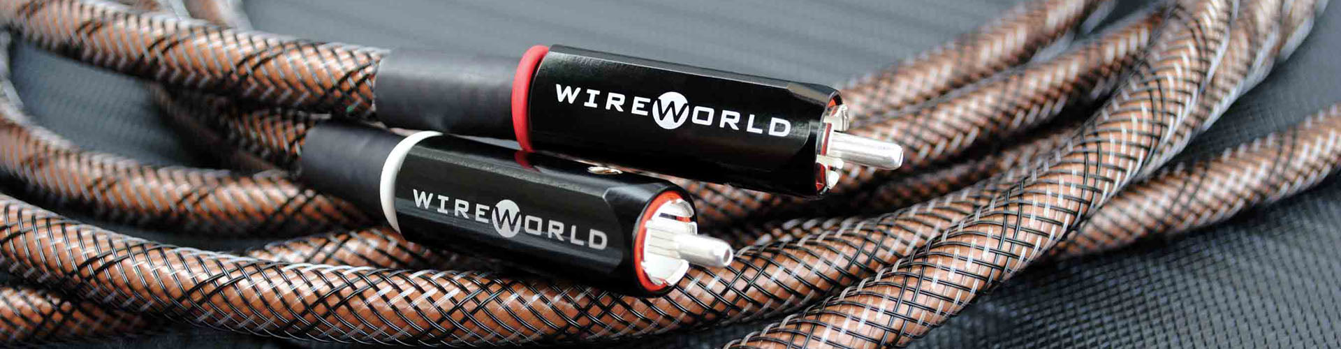 WireWorld audio cable with braided design on a dark background