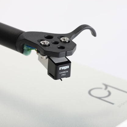 Rega carbon pro phonograph cartridge on a white background