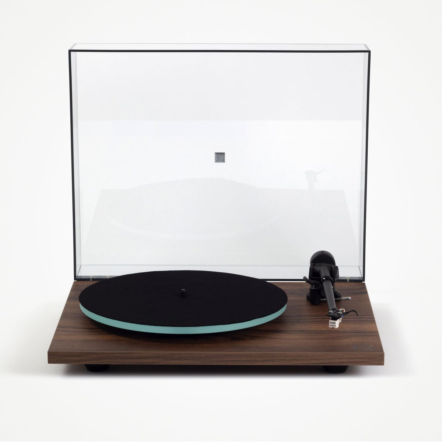 Turntable with wooden base and clear dust cover on a white background