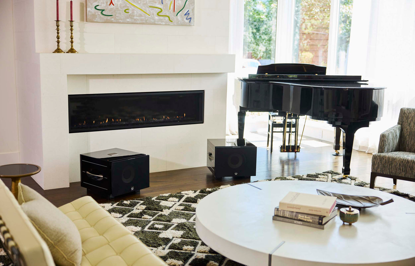 Living room with a grand piano, fireplace, and modern decor.