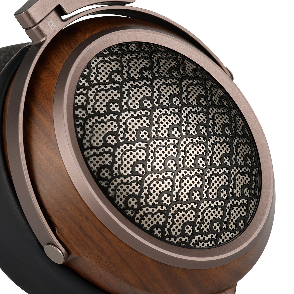 Close-up of a pair of headphones with wooden and metallic design on a white background