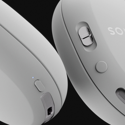 Close up of white Sonos Ace Ultra Headphones on black background