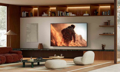 Sony TV on wall mount in living room with shelves above and furniture