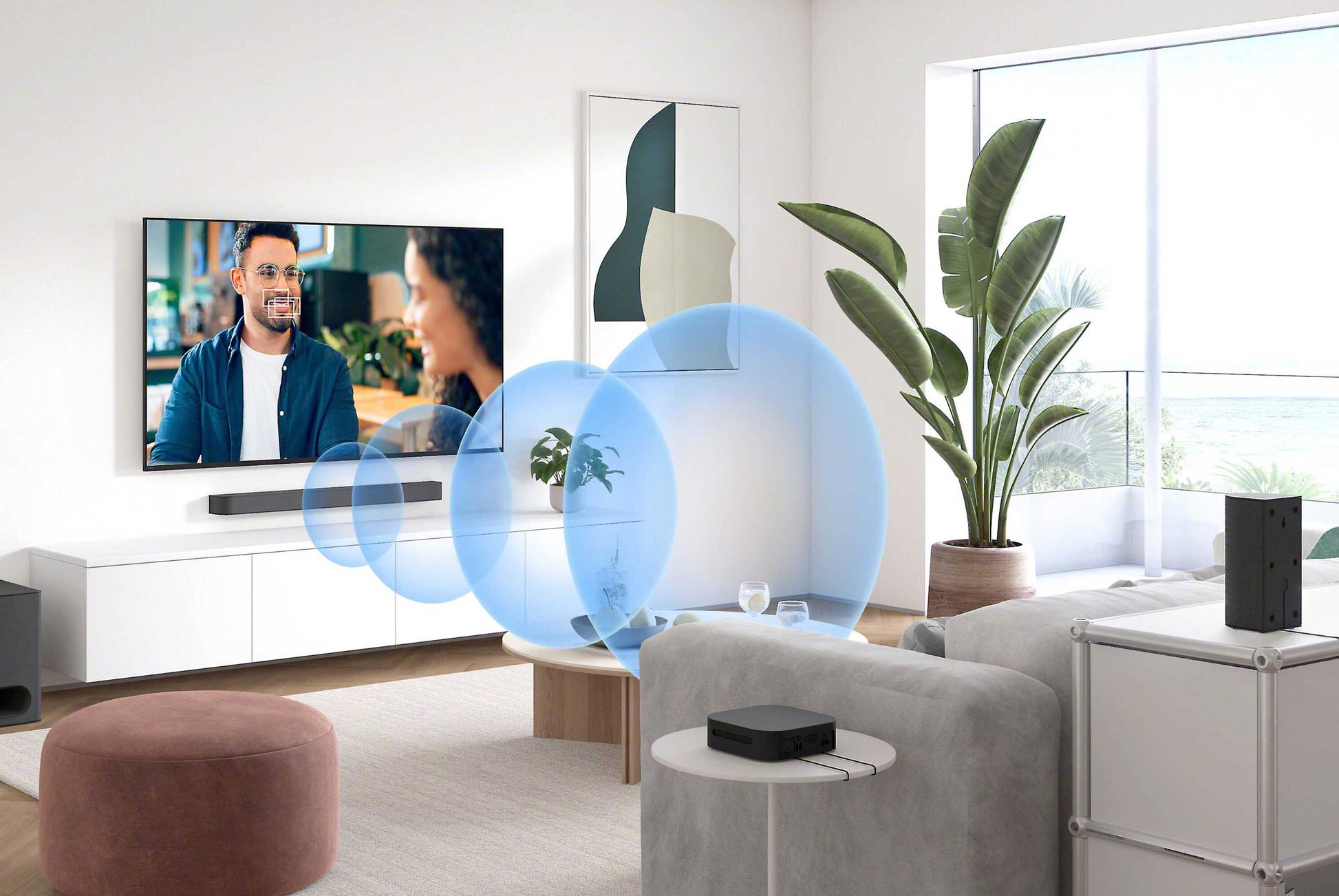 Modern living room with a TV, sofa, and decorative elements.