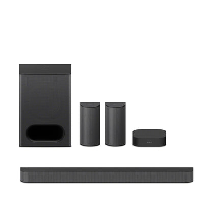 Black home theater speaker system on a white background