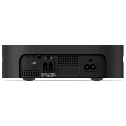 Back view of a black electronic device with ports on a white background