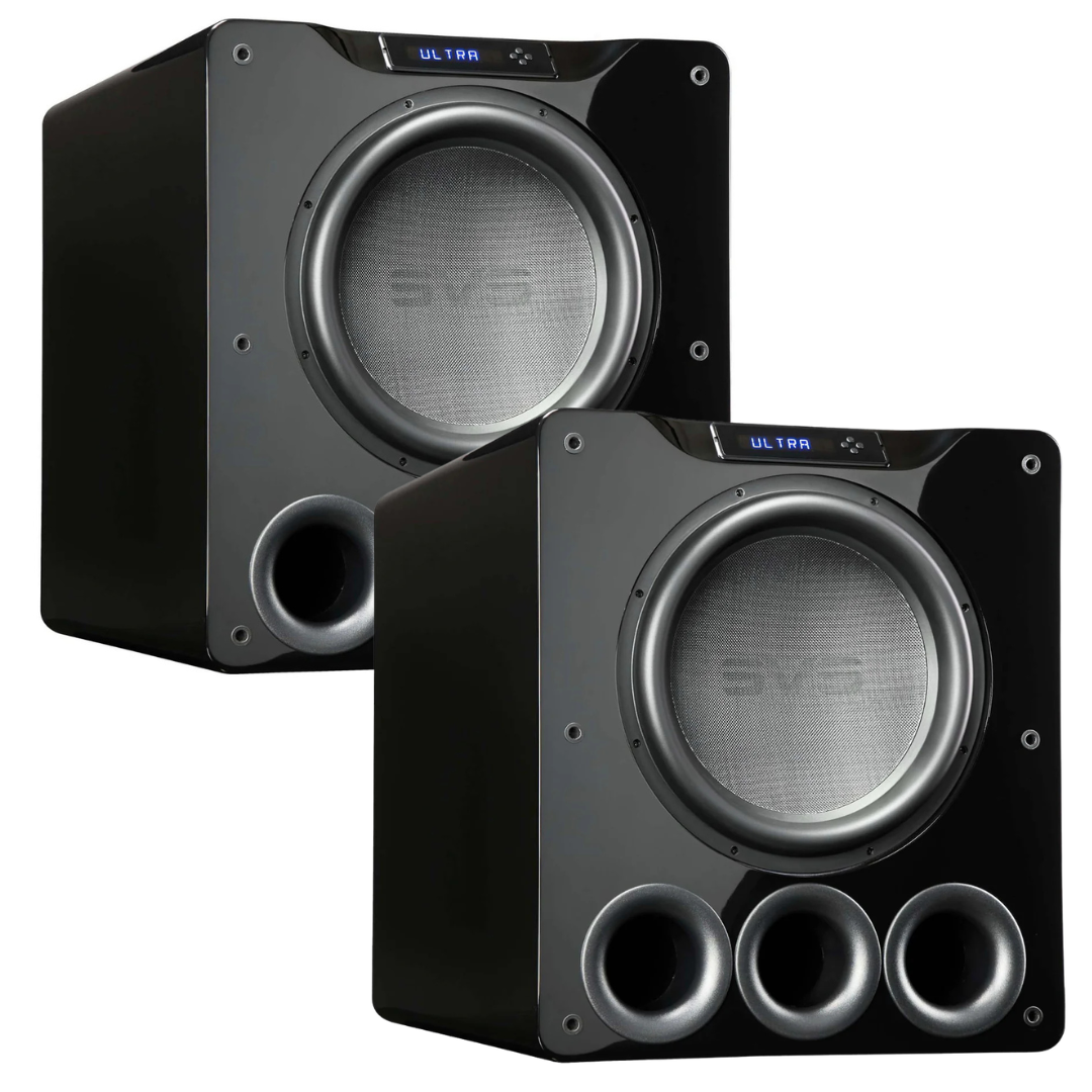 Two black subwoofers with visible branding on a white background