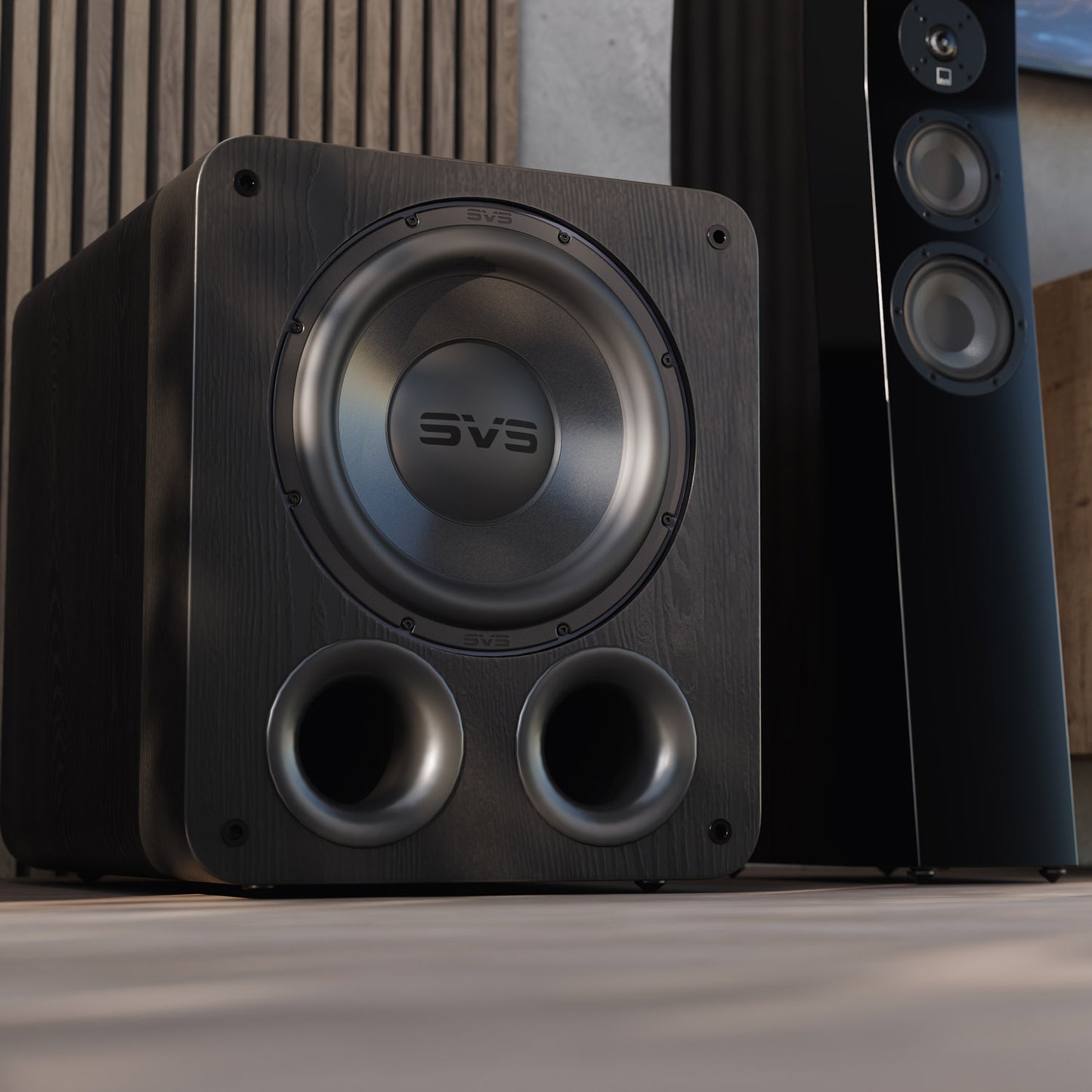 Black subwoofer with 'SVS' branding in a home theater setup.