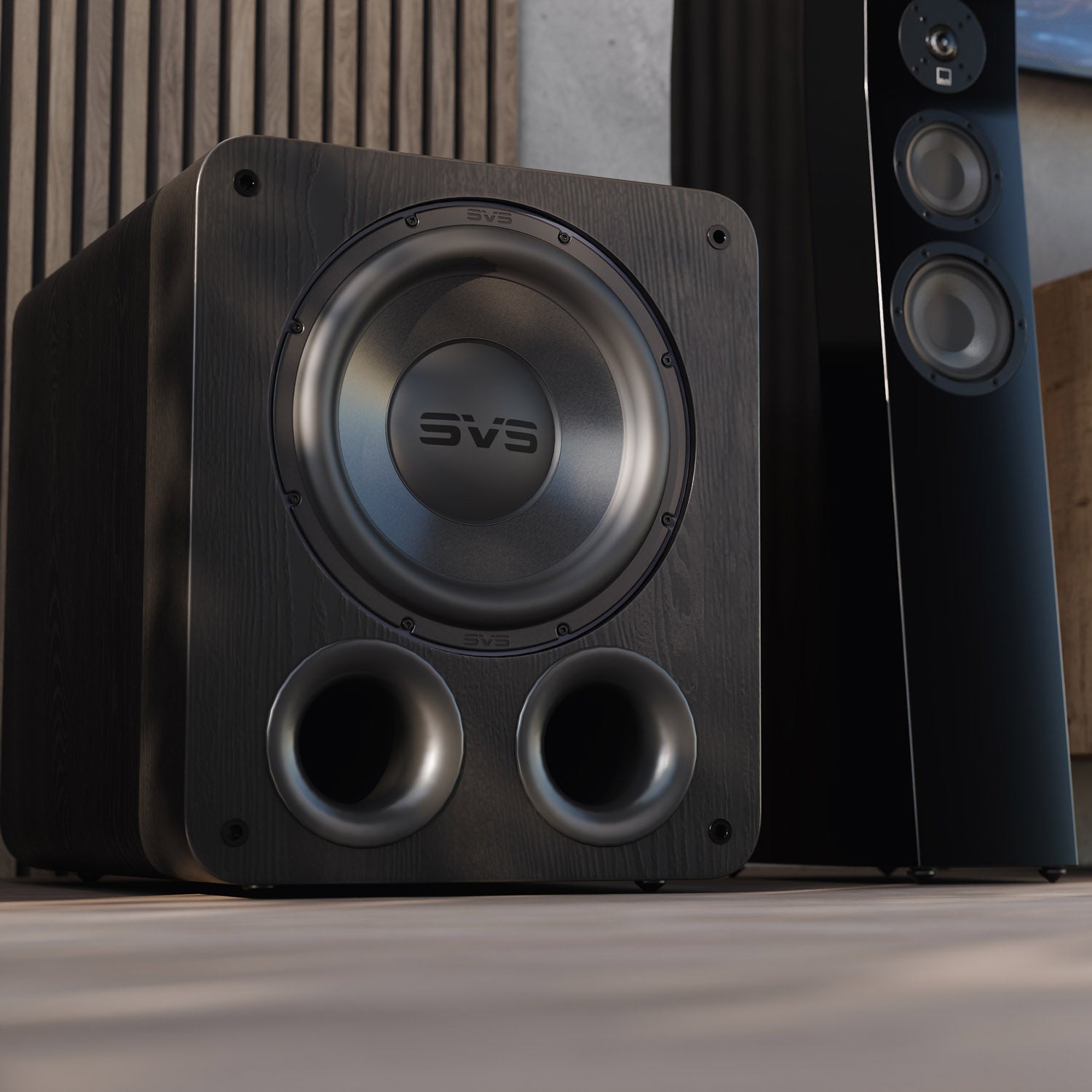 Black subwoofer with 'SVS' branding in a home theater setup.