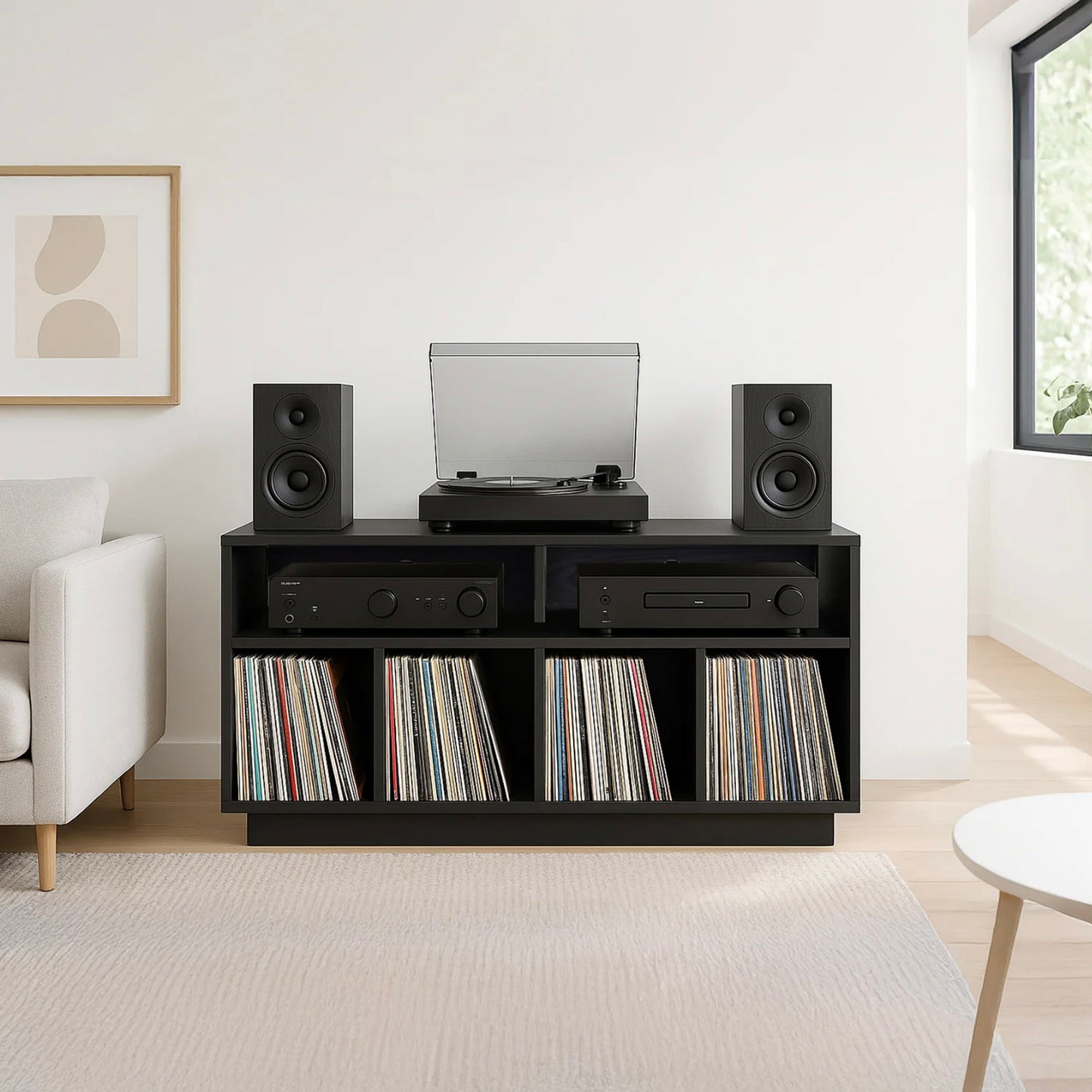 Black Tauris Edison 1200 Media Cabinet with speakers, record player, and vinyl records in a living room setting.
