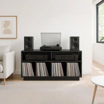 Black Tauris Edison 1200 Media Cabinet with speakers, record player, and vinyl records in a living room setting.