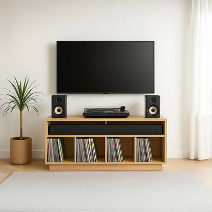 Modern living room with a TV, speakers, and vinyl records on a Tauris Edison 1200 Media Cabinet.