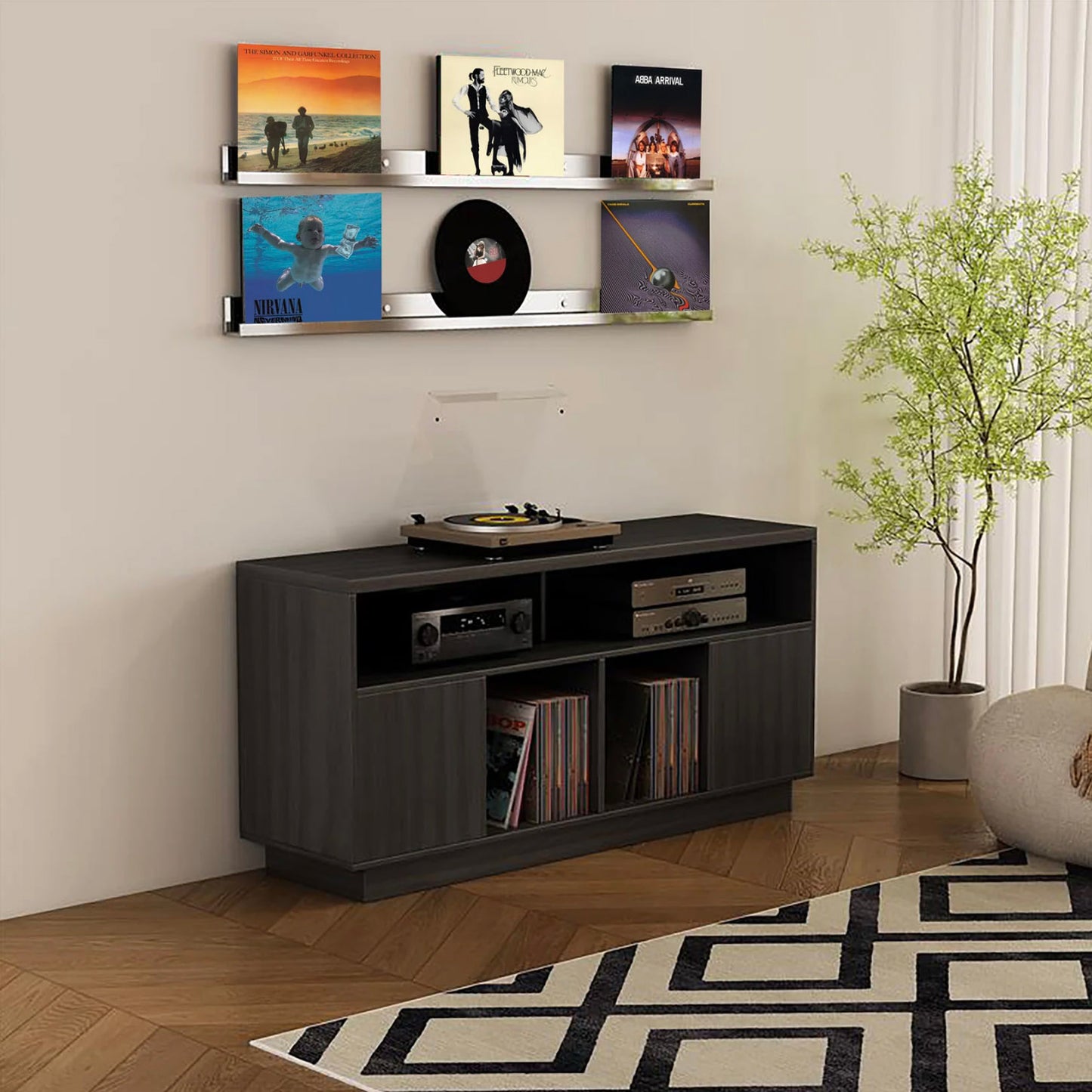 Tauris Edison 1400 Media Cabinet in black oak in living room with plant in corner and records on wall