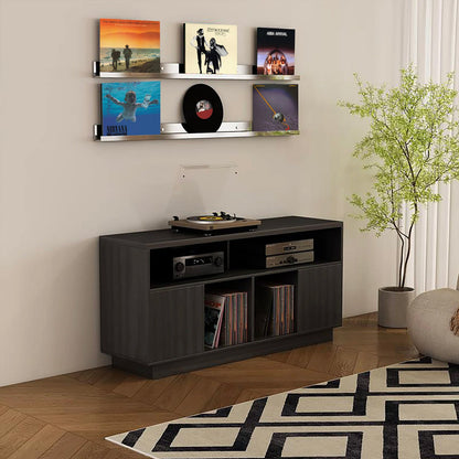 Tauris Edison 1400 Media Cabinet in black oak in living room with plant in corner and records on wall