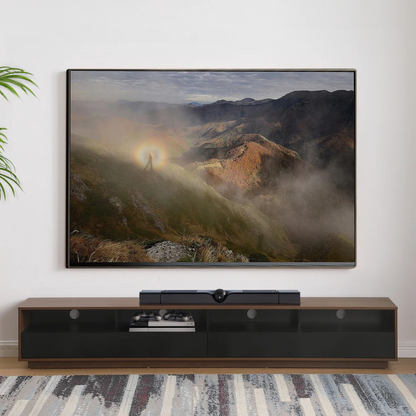 Front view of Tauris Suave 2200 TV Cabinet in living room with tv mounted on wall