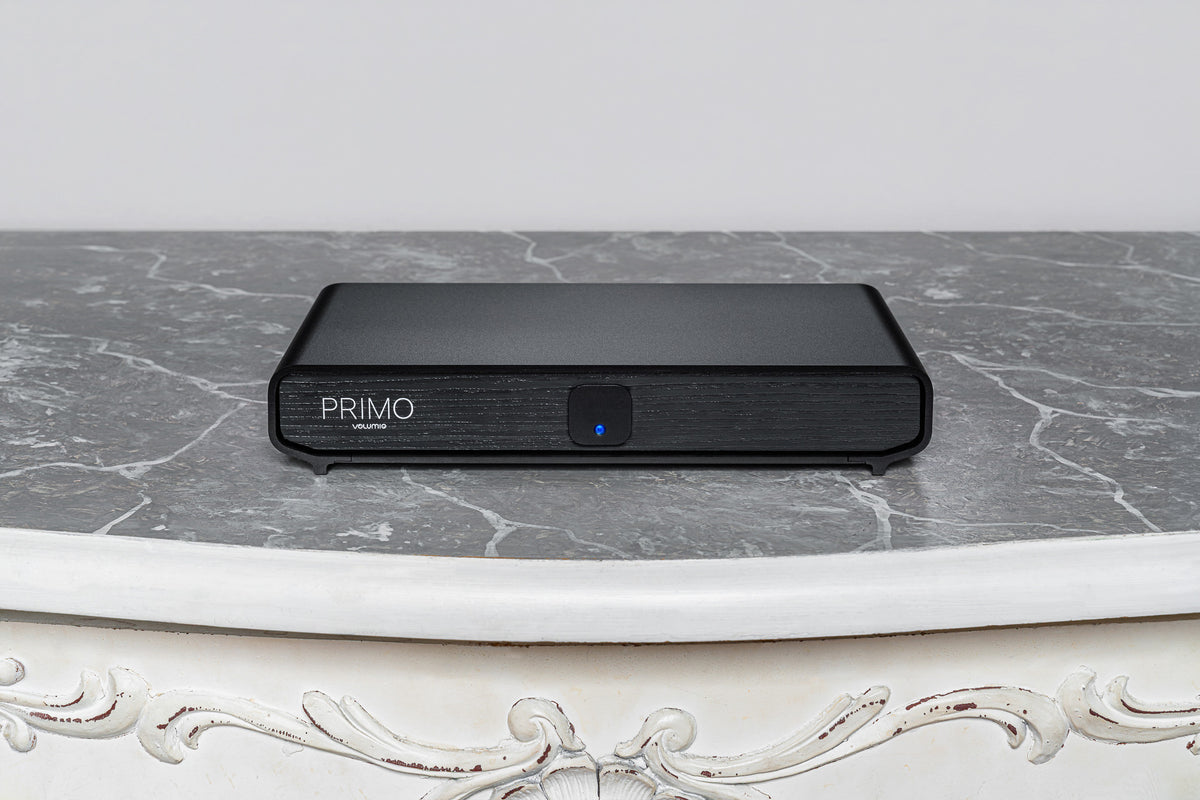 Volumio Primo V3 Streaming DAC sitting on a grey marble bench