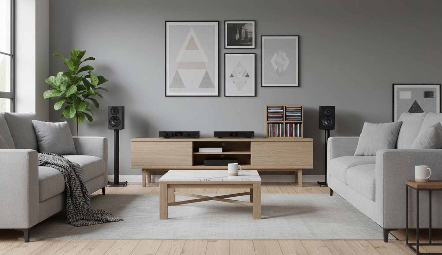 Modern living room with gray sofas, wooden coffee table, and decorative items.