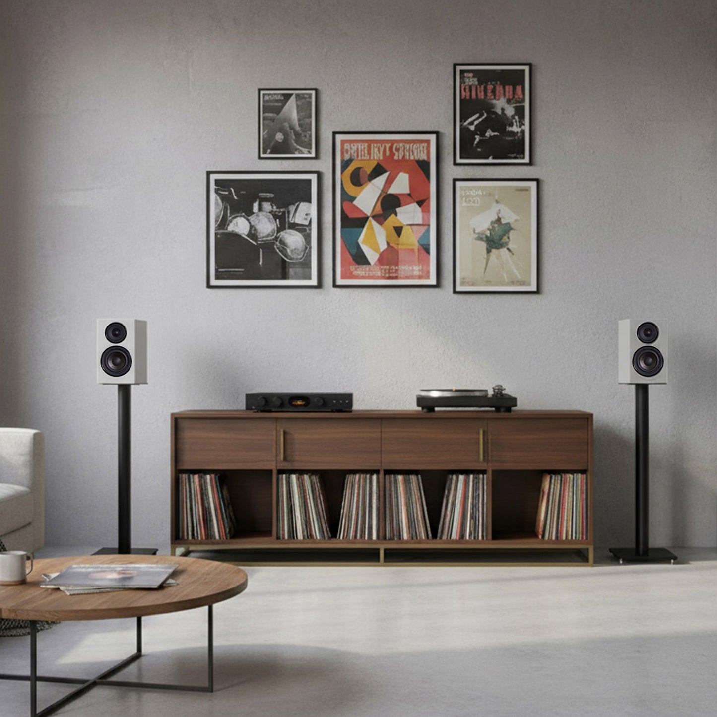 Living room with wooden console table, speakers, and wall art