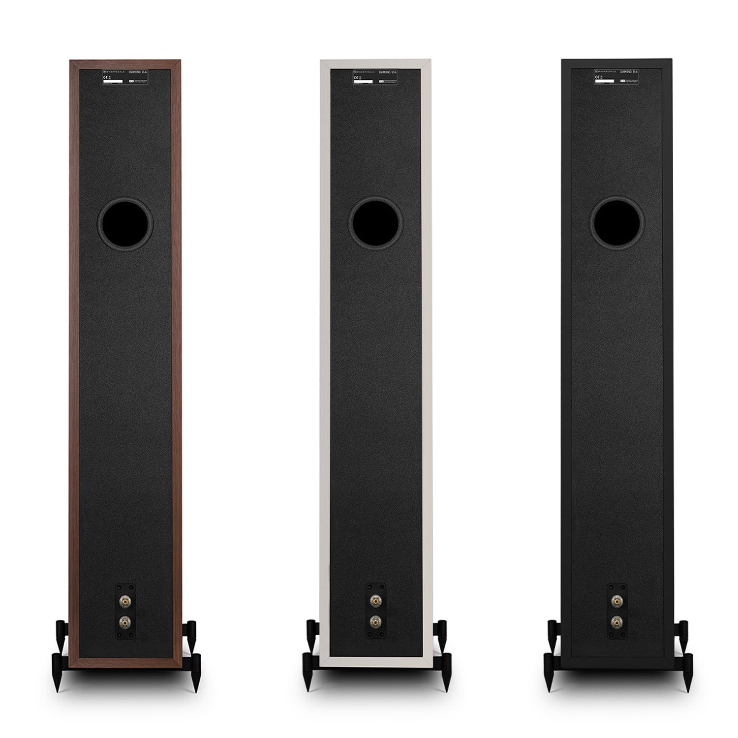 Back view of 3 Wharfedale Diamond 12.4i Speakers speakers of different colours on a white background
