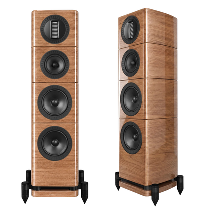 Two matching floorstanding speakers with a glossy light brown wood-grain finish and black drivers, shown from the front and three-quarter angles on a white background.