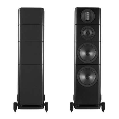 Two black floorstanding speakers shown side by side against a white background, with the left speaker displaying its rear panel and the right speaker displaying its front panel with three drivers and a tweeter.