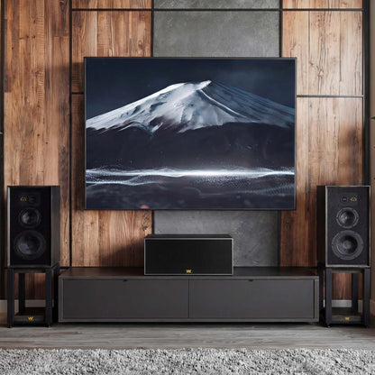 Modern home theater setup with a large TV displaying a mountain scene, flanked by speakers on a wooden wall.