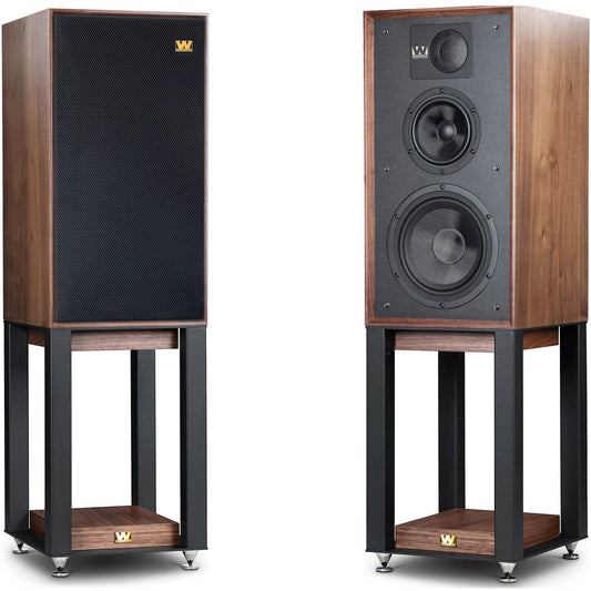 A pair of Wharfedale Linton Heritage speakers with a black front grille and wood veneer finish, placed on matching stands.