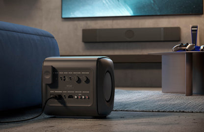 KEF XIO Dolby Atmos Soundbar in Slate Black - Lifestyle with KC62 Subwoofer