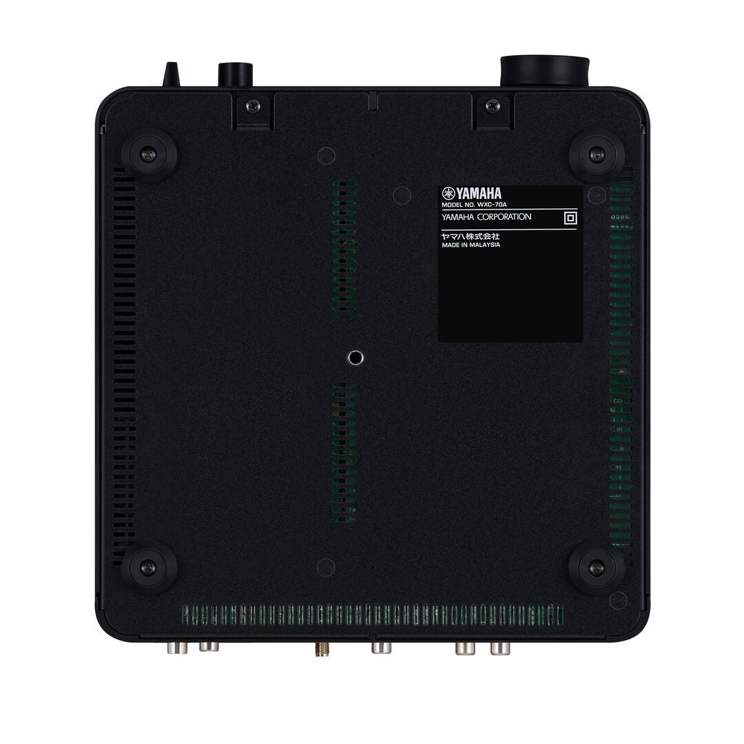 Underneath view of black Yamaha WXC-70A Streamer on a white background