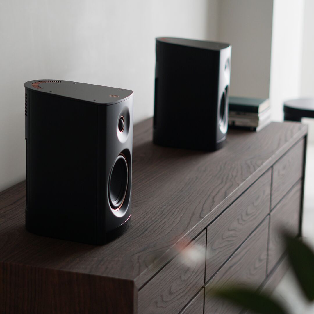 2 Yamaha NX-70A Wireless Hi-Fi Speaker System on timber cabinet