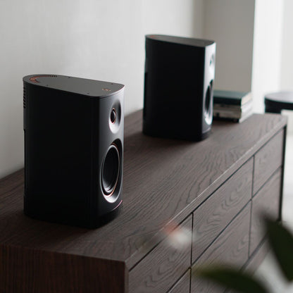 2 Yamaha NX-70A Wireless Hi-Fi Speaker System on timber cabinet